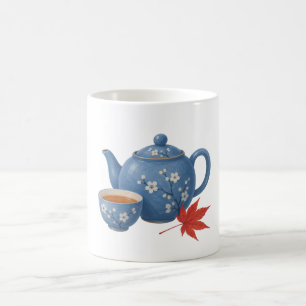 Teekanne und herbstliches Ahornblatt Kaffeetasse
