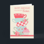 Teekuppen und Rose, Happy Birthday Sister Karte<br><div class="desc">Feiern Sie mit dieser hübschen Karte einen besonderen Geburtstag der Schwester mit einem Set Teebecher in Blume,  Polka Dot und Gingham-Muster,  rosa Rosen und einem Kuchen mit rosa Polka Dots Herzklopfen. Hintergrund ist Creme mit einem Korallenrandstreifen. Graphics©MyClipartStore</div>