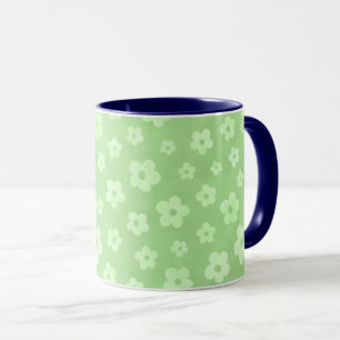 Teetasse mit blauem Griff, grün-weiße Blume