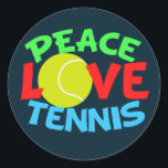 Tennis Liebe Blue Christmas Runder Aufkleber<br><div class="desc">Ich Liebe Tennisspielen. Ein niedliches Tennisspielgeschenk mit einem gelben Tennisball als O in der Liebe. Peace Liebe Tennis in grün,  rot und blau geschrieben.</div>
