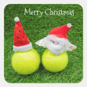 Tennis Weihnachten mit Weihnachtsmannmütze auf Te Quadratischer Aufkleber
