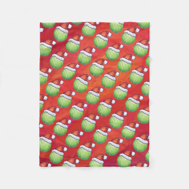 Tennisball in Weihnachtsmannmütze Muster auf Rot Fleecedecke (Vorderseite)