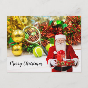 Tennisball und Schläger mit Weihnachtsdekoration Postkarte