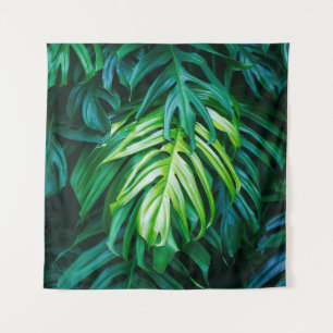 Tenture Feuilles verts tropicaux sur arrière - plan sombre