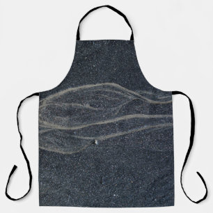 Teppich aus schwarzem und weißem Bereich Schürze