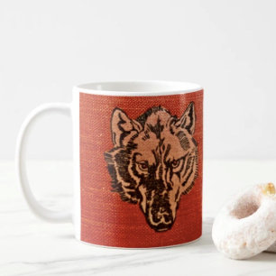 Tête de loup sur mug rouge