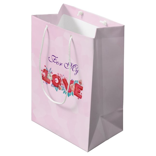 Text der roten Liebe in fett formatierten Blockbuc Mittlere Geschenktüte (Vorderseite Schrägansicht)