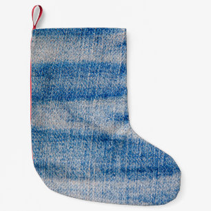 Textilien aus blauem Jeans, textiler Hintergrund Kleiner Weihnachtsstrumpf
