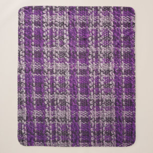 Textur des lila Tartan-Stoffes als Rückgrat Sherpadecke