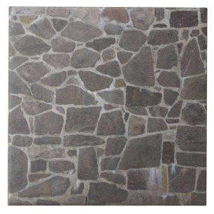 Textur einer grauen Steinmauer Fliese