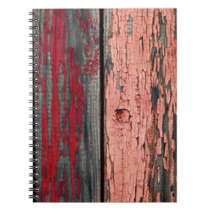 Textur eines alten Holzzauns, rot und orange gestr Notizblock
