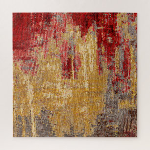 Textur eines orientalischen rot-goldenen Teppichs.