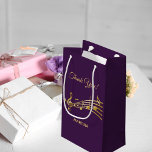 Thank You music notes purple gold name Kleine Geschenktüte<br><div class="desc">Elegant dark purple background with faux gold music notes. With the text: Thank You! Golden hand lettered style script. Template for a name or names.
Perfect as a favor bag for a birthday party,  wedding,  wedding anniversary,  baby shower or bridal shower!</div>