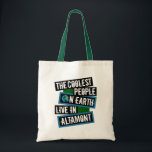 The Coolest People on Earth Live in Altamont Tragetasche<br><div class="desc">This design features bold, layered text with the phrase "The Coolest People on Earth Live in Altamont" in a striking cool color palette. A globe graphic, integrated with coordinating blue and green blocks, symbolizes the city's global appeal. The design is suitable for showcasing local pride, as it boldly declares Altamont's...</div>