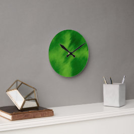 The cross and the green of the forest runde wanduhr