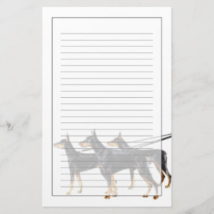 Three Dobermans on leash Briefpapier