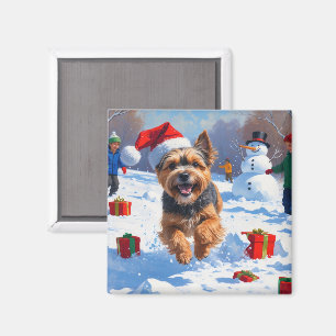 Tibet-Terrier läuft im Schnee mit Weihnachtsmütze Magnet