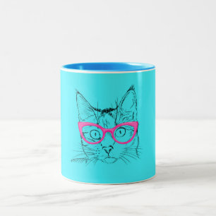Tierniedliche blaue Katze des liebhaber- in den Zweifarbige Tasse