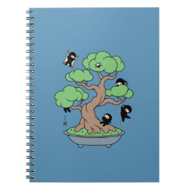 Tiny Ninjas in Bonsai Tree on Blue Notizblock
