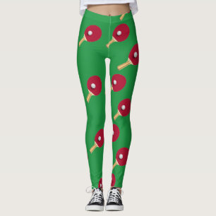 Tischtennisschläger und Ball auf Grün Leggings