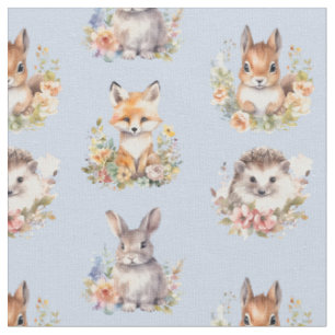 Tissu Animaux de bois sur bleu clair