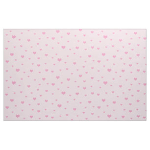 Tissu Coeurs roses éparpillés sur rose pâle
