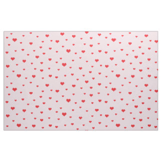 Tissu Coeurs rouges éparpillés sur couleur rose pâle