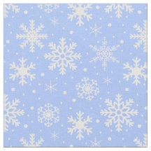 Les flocons de neige sur le bleu glacé