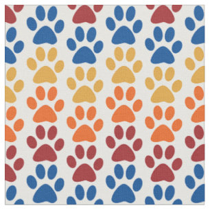 Tissu Motif d'empreinte de patte en rouge, bleu, jaune,