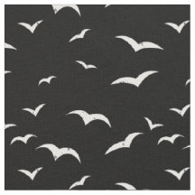 Oiseaux volants noirs et blancs Revêtus
