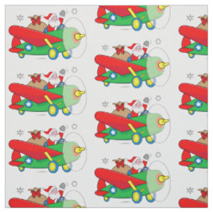 Tissu Père Noël pilotant l'avion avec des cadeaux