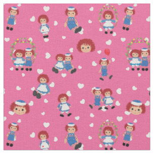 Tissu Raggedy Ann et Andy sur des cœurs qui tombent sur