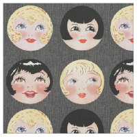 Visages de poupées vintage sur fond de denim noir
