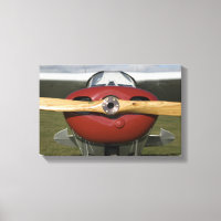 Avion rouge et hélice en bois