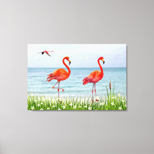 Toile Beaux flamants roses près de fleurs blanches sur t