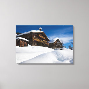 Toile cabines traditionnels en bois dans la neige