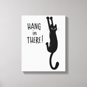 Toile Chat noir amusant accroché  Attendez là !