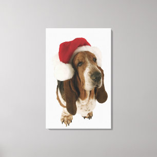 Toile Chien de basset dans le casquette de Père Noël