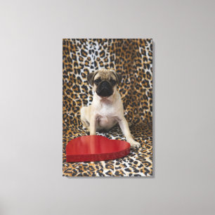 Toile Chiot de carlin se reposant contre le poster de