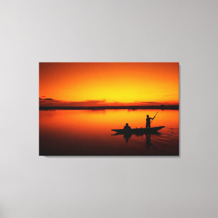 Toile Coucher de soleil, bateau à rames dans la mer