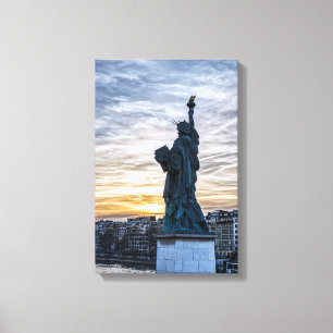 Toile Coucher de soleil sur la réplique de la statue de
