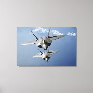 Toile Deux F-22 Raptors survolent l'océan Pacifique