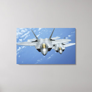 Toile Deux F-22 Raptors survolent l'océan Pacifique 2