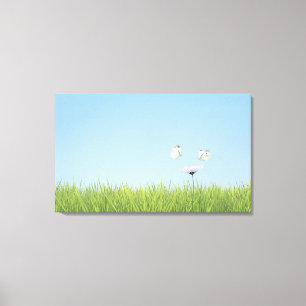 Toile Deux papillons planant au-dessus de la fleur