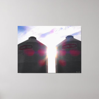 Toile Deux silos au lever du soleil