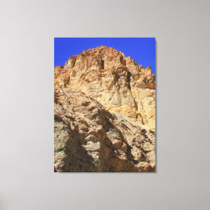 Toile Falaise du désert doré sous ciel bleu