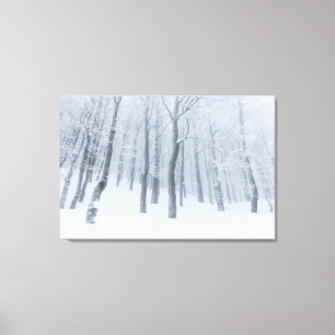 Toile Forêt gelée couverte de neige en hiver