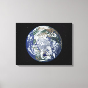 Toile La terre entièrement allumée portée sur le Pôl
