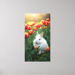 Toile le lapin blanc moelleux est assis parmi les tulipe