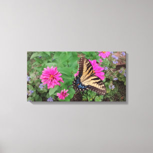 Toile Le Tigre Swallowtail parmi les fleurs roses et vio
